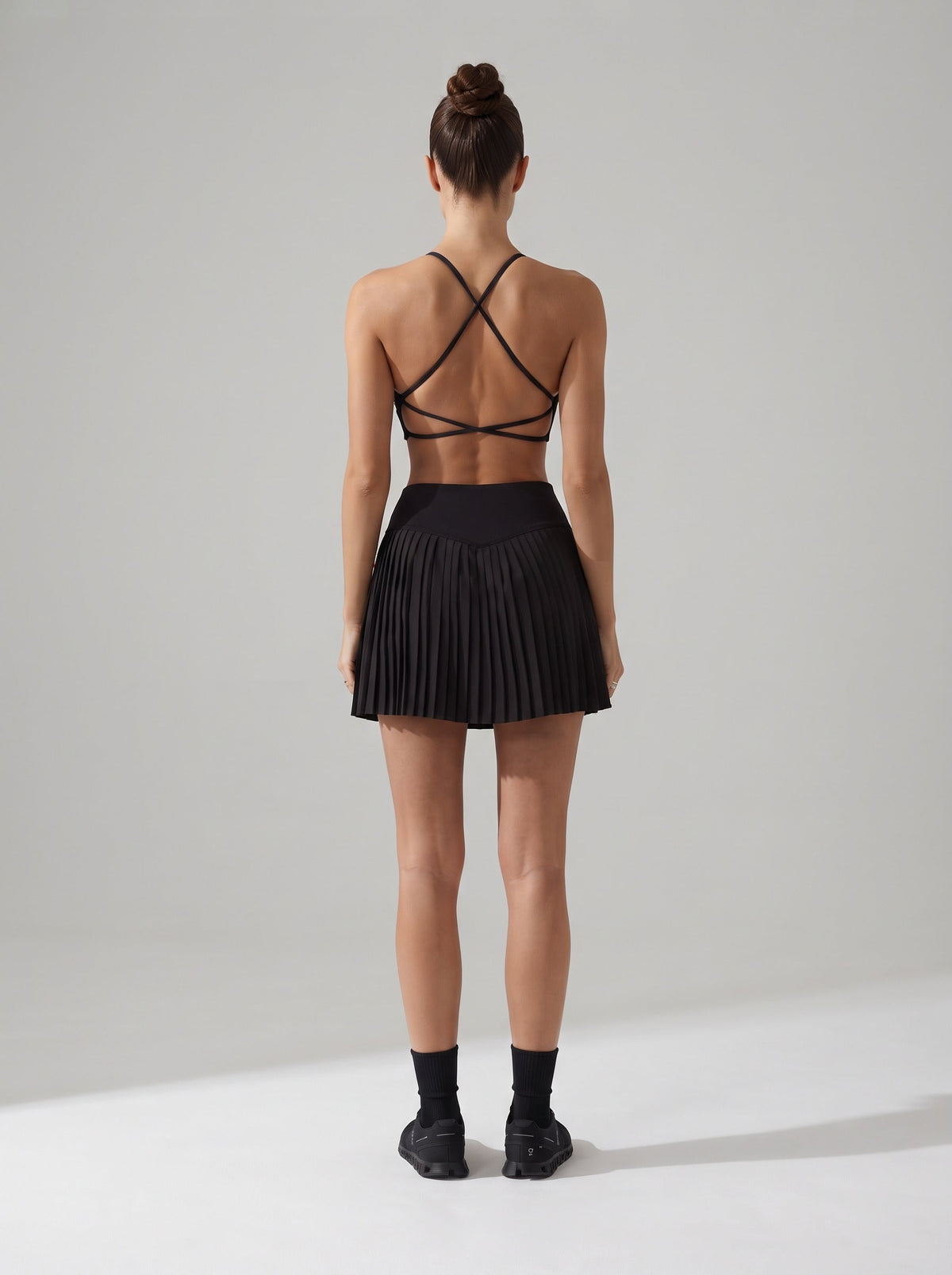 Women's Pleated Tennis Skirt with Built-In Shorts in Black – photo 4
